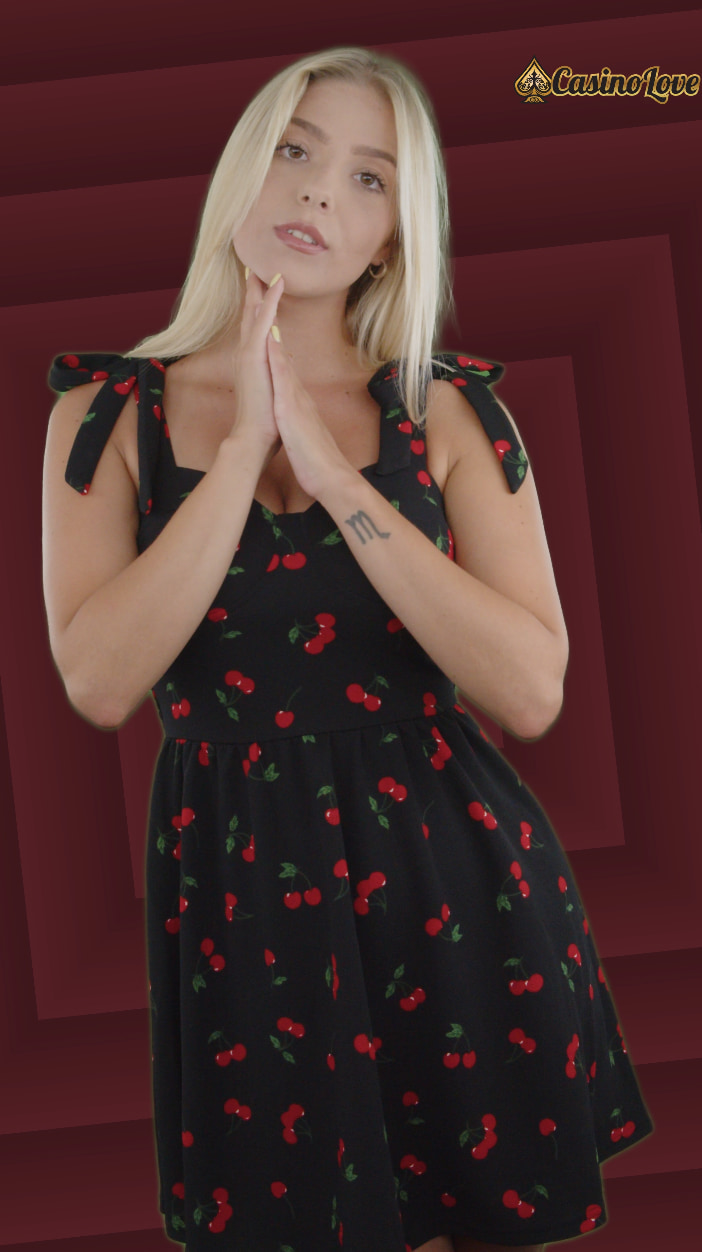 Elegant black dress with cherry pattern